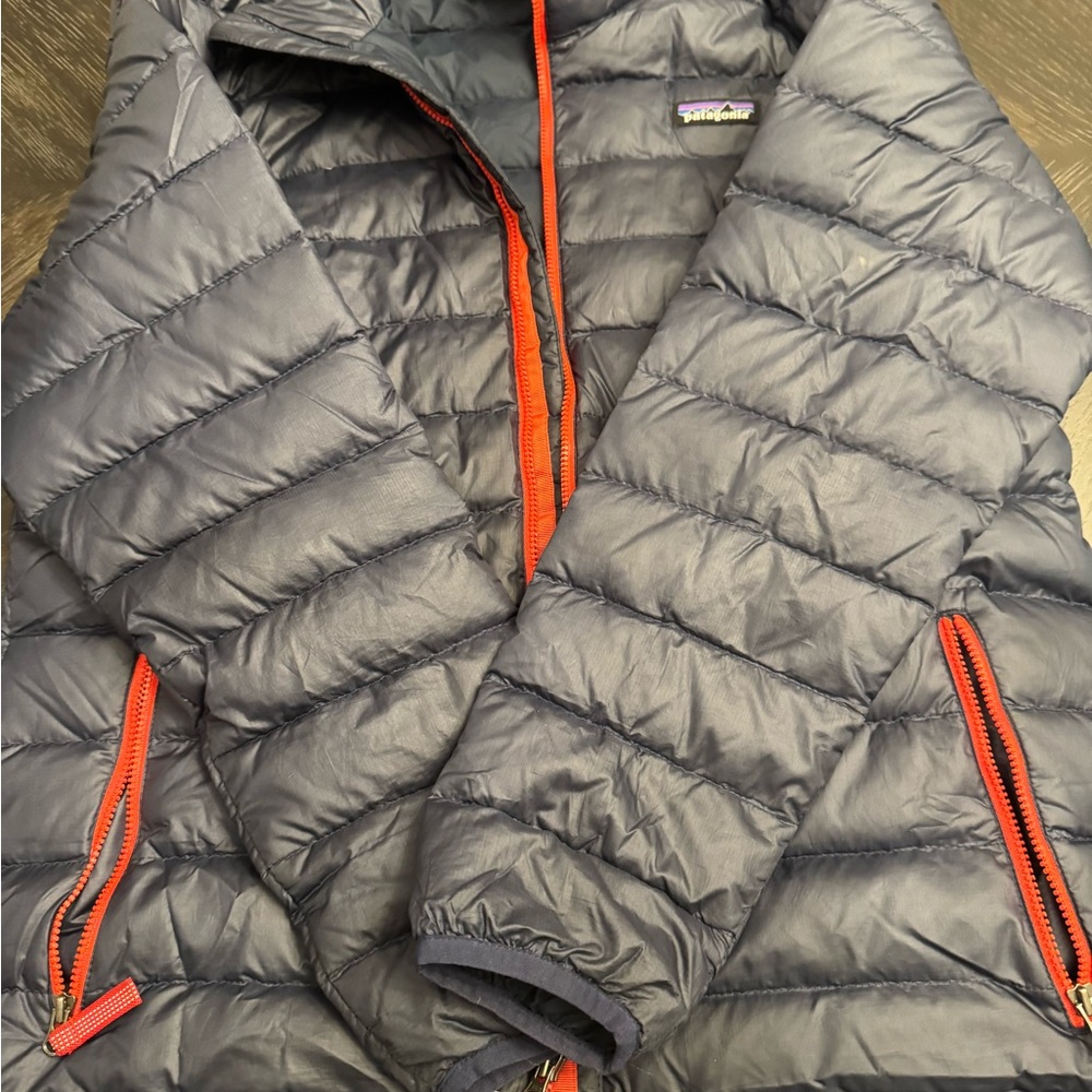 Patagonia Dark Blue Quilted Jacket with Bright Red Zippers